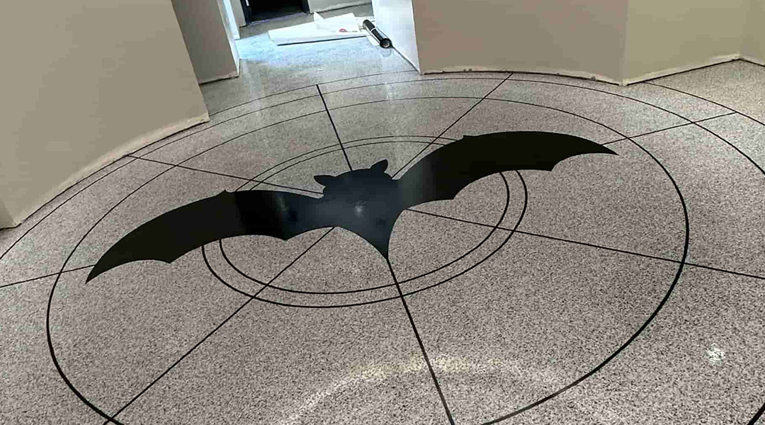 bat signal on floor